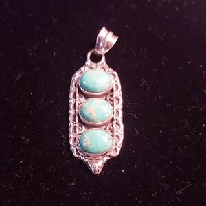 Elegant Sterling Silver and Turquoise Pendant 925
